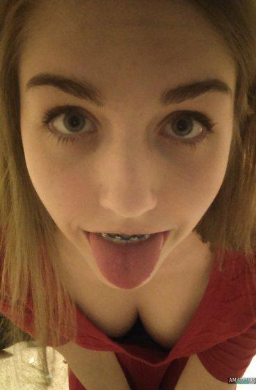 Girls sticking tongues out