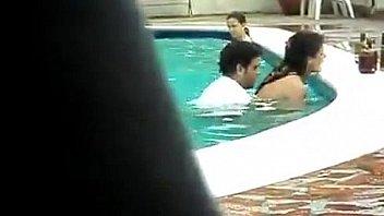 Teen couple having public pool