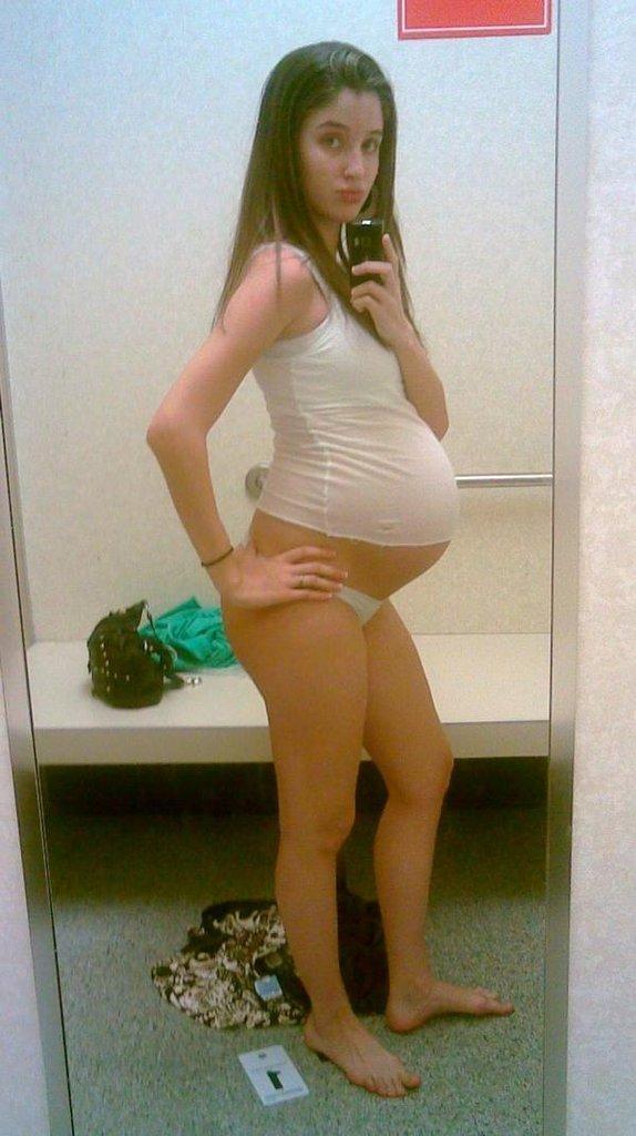 Tiny pregnant teen